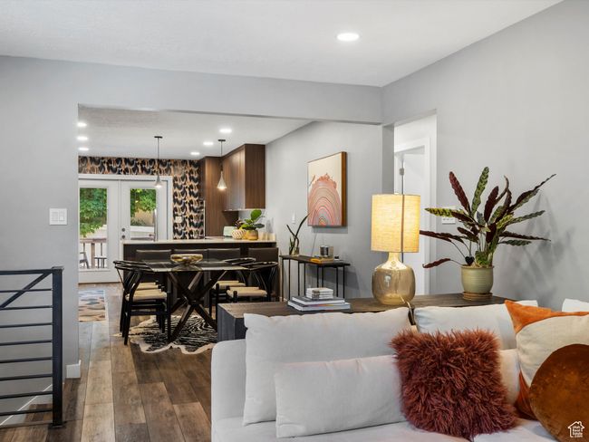 Living room with french doors, dark wood-type flooring, and recessed lighting | Image 8