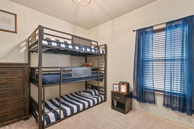 Bedroom with carpet floors | Image 19