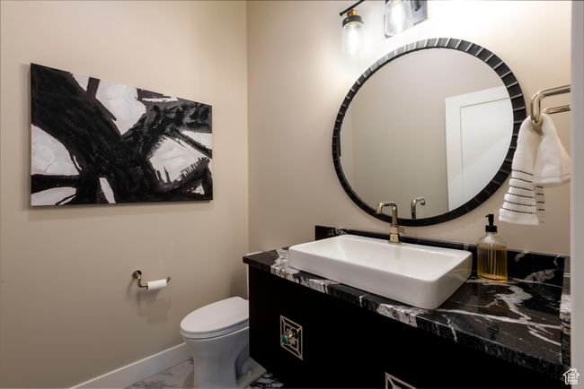 Half bathroom with marble look tile flooring and vanity | Image 48
