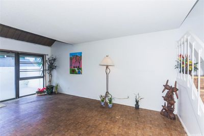 Living room flows out to the private lanai/patio | Image 2