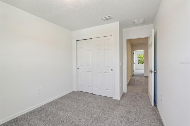 16419 Bird Of Paradise Ave, Townhouse with 3 bedrooms, 3 bathrooms and null parking in CLERMONT FL | Image 23