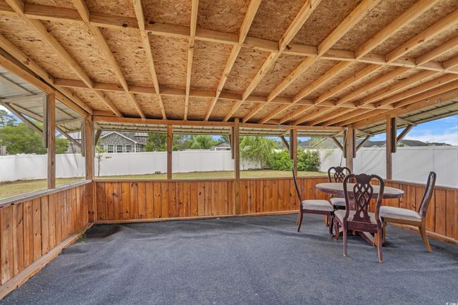 View of unfurnished sunroom | Image 23