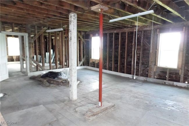 Miscellaneous room featuring a wealth of natural light | Image 17