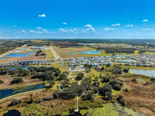 9804 Rowing Dale Bnd, House other with 4 bedrooms, 3 bathrooms and null parking in WESLEY CHAPEL FL | Image 71
