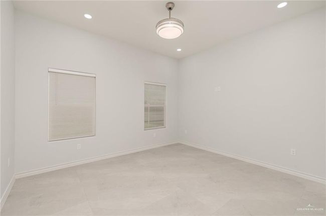 Unfurnished room with recessed lighting and baseboards | Image 10