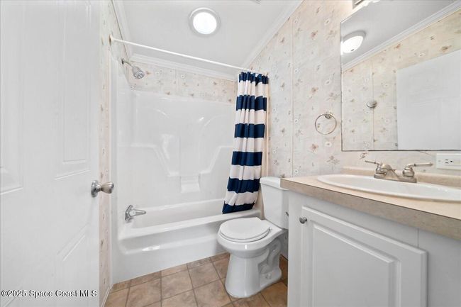 641 Hyacinth Cir, House other with 2 bedrooms, 2 bathrooms and null parking in Barefoot Bay FL | Image 14