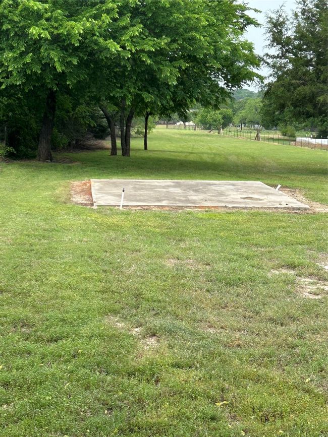 View of yard with fence | Image 9
