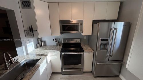 apt-103-2761 S Oakland Forest Dr, Oakland Park, FL, 33309-5659 | Card Image