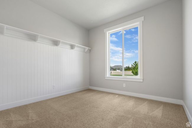 Unfurnished room with carpet floors and baseboards | Image 15