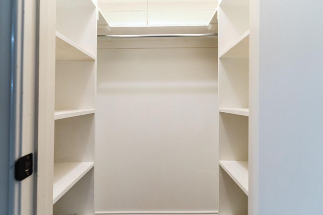View of spacious closet | Image 19