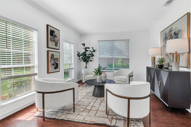 Formal living area flooded with natural light | Image 7