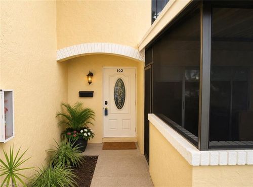102 E Greens Blvd, LEHIGH ACRES, FL, 33936-5285 | Card Image