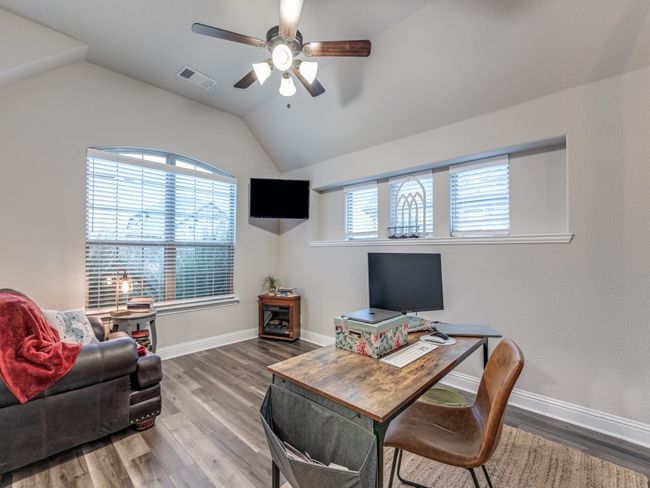 Office featuring ceiling fan, lofted ceiling, and hardwood / wood-style floors | Image 10