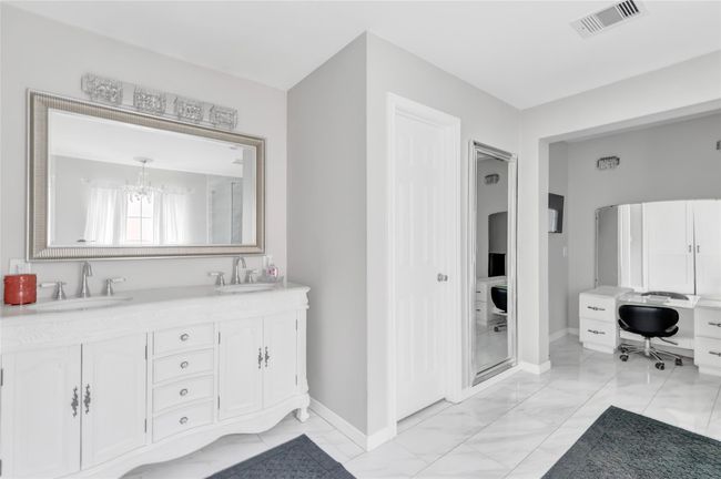 Tastefully upgraded with cool color tones and new lighting. | Image 17