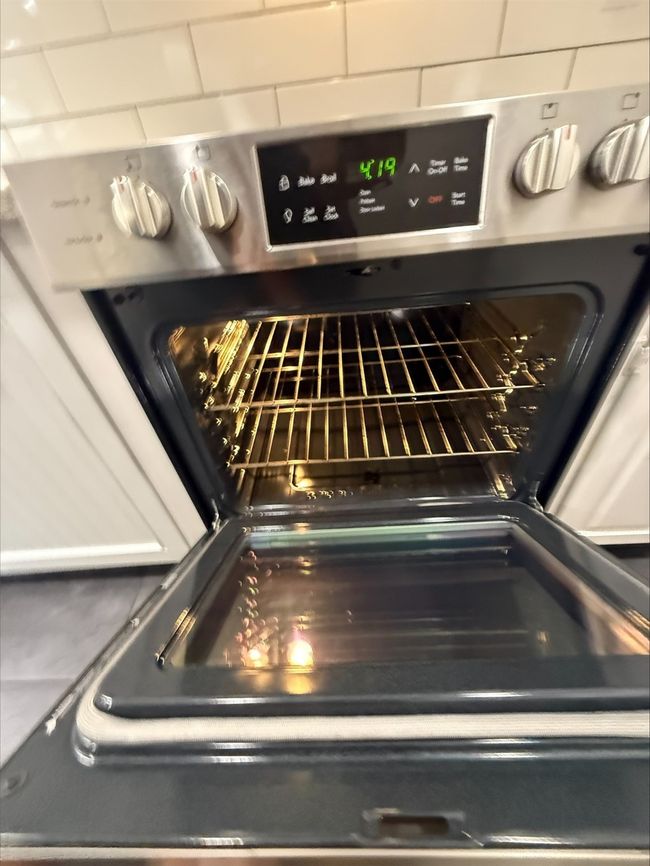 Kitchen view of stove | Image 15