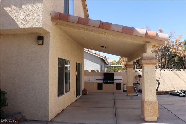 View of patio featuring an outdoor kitchen | Image 67