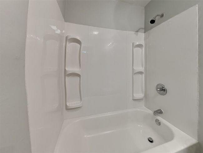 Full bath featuring tub / shower combination | Image 14