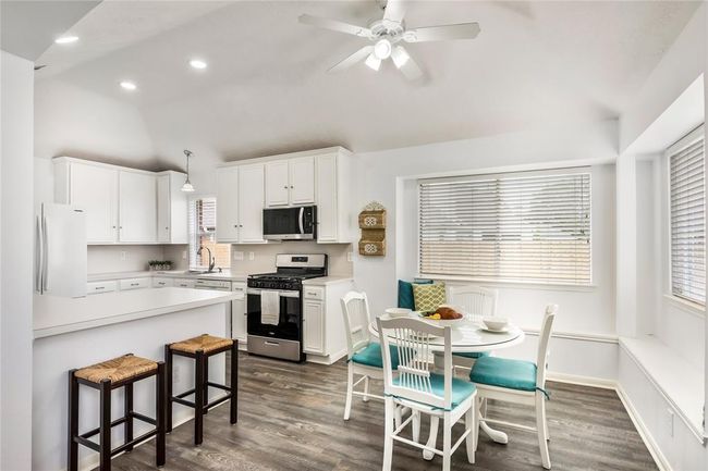 Breakfast room with window seating. | Image 15
