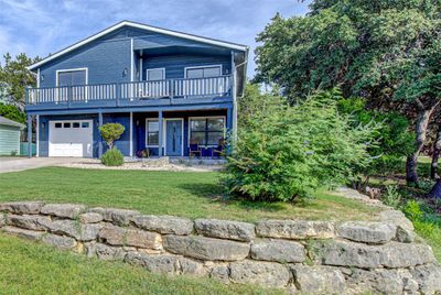 Front of Home and Flat Yard. Lots of Views Of Lake. | Image 3