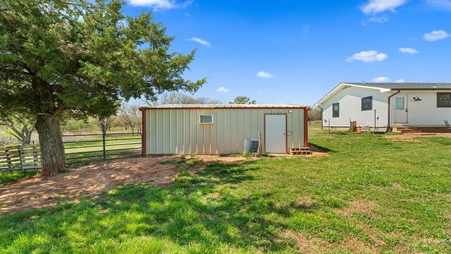 View of shed featuring fence | Image 12