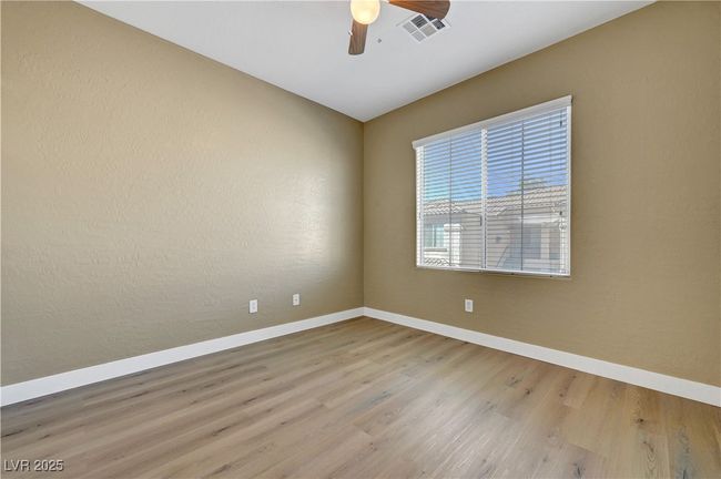 2nd and 3rd bedroom with baseboards, visible vents, and a ceiling fan | Image 20