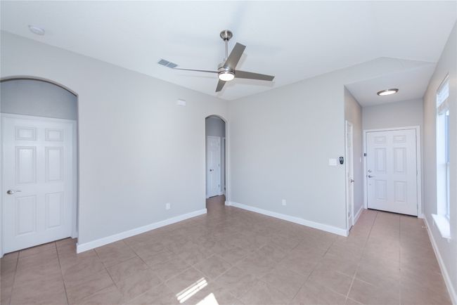 Door on far left leads to primary bedroom | Image 4