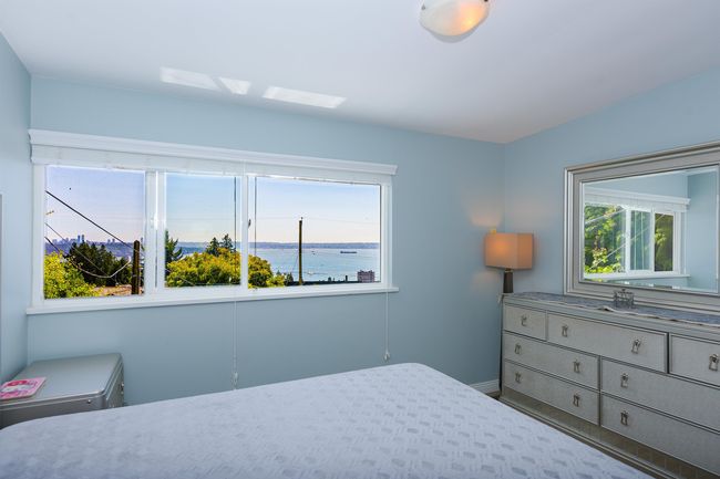 Bedroom featuring baseboards | Image 18