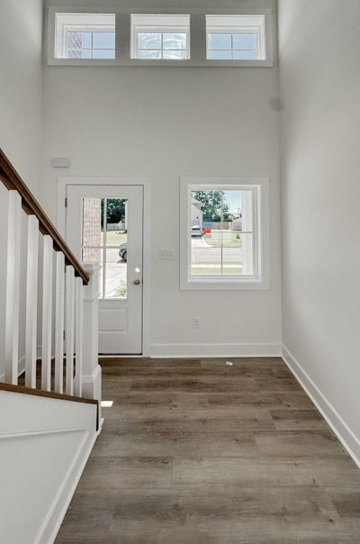 Beautiful 2 story foyer with LVP stairs | Image 2