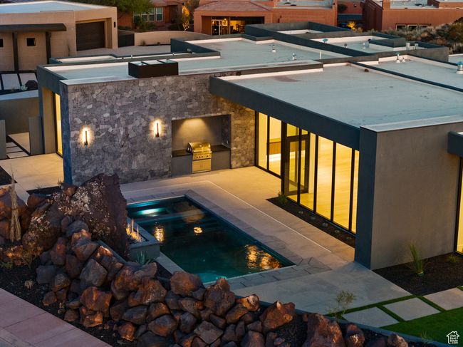 Pool featuring a patio and area for grilling | Image 7