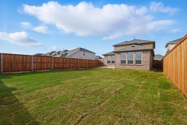 View of big yard with a fenced backyard | Image 24
