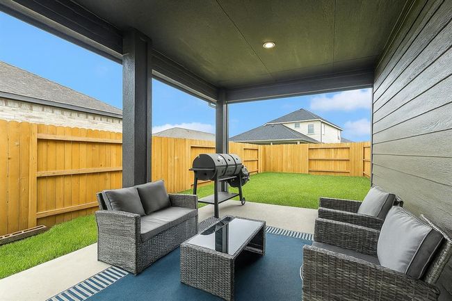 Grill, entertain, and relax on your extended patio | Image 20