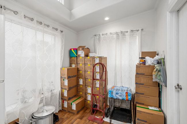 Breakfast area off kitchen, pardon the boxes - we are getting ready to move already !! | Image 13