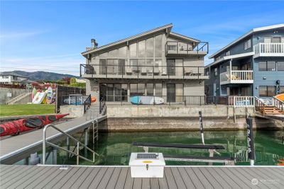 The dock has been replaced from the pilings to the decking, swimming stairs were added, as was a 5K lb boat lift with 5' range for extended season. All that plus a buoy! | Image 2