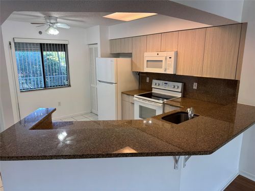 apt-208-2334 S Cypress Bend Dr, Pompano Beach, FL, 33069-4499 | Card Image