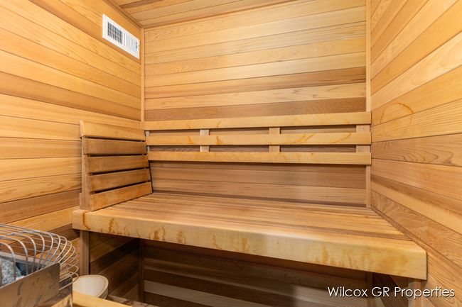 Remarkable custom built sauna in lower level finished walkout area. | Image 34