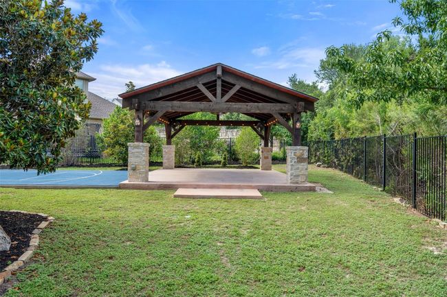 View of yard with a Pavilion and sports court | Image 32