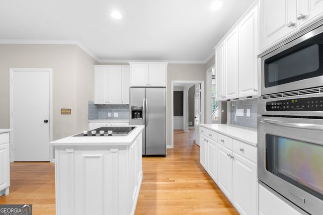 315 Trevington Ct, House other with 7 bedrooms, 5 bathrooms and null parking in Alpharetta GA | Image 12