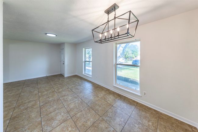 Formal dining area with new chandelier | Image 8