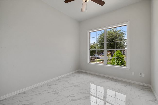 4th spare room with closet and ceiling fan | Image 31