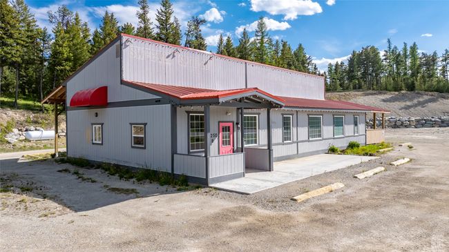 View of front of house with metal roof | Image 104