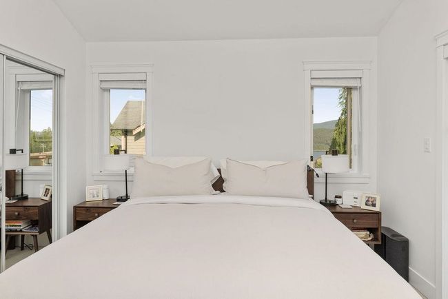 Bright and airy primary bedroom with private patio | Image 20