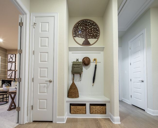 Mudroom featuring light wood-style flooring and baseboards | Image 21