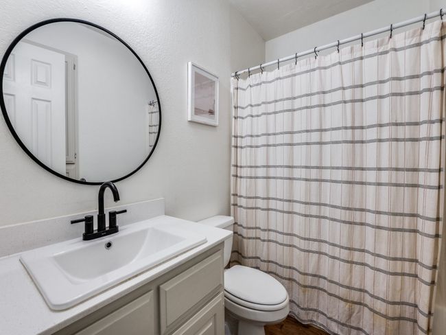 Full bathroom with vanity and a shower with curtain | Image 20