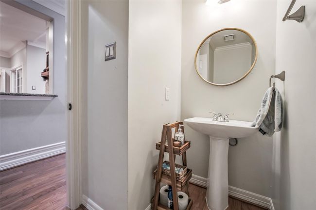Half bathroom located on the first floor. | Image 14