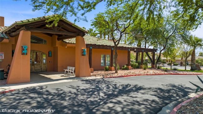 View of front facade featuring a tile roof and stucco siding | Image 66
