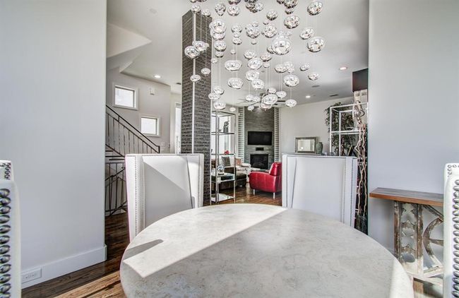 Another view of this incredible breakfast area off the kitchen and living room! | Image 18
