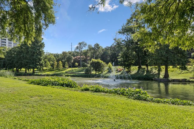 View of property's community with a water view and a lawn | Image 27