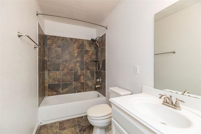 Full Bathrooms. Clean and functional bathrooms with modern fixtures. | Image 12
