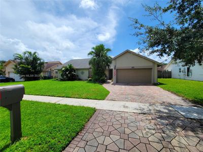 8300 Nw 51st Ct, House other with 4 bedrooms, 2 bathrooms and null parking in Lauderhill FL | Image 2