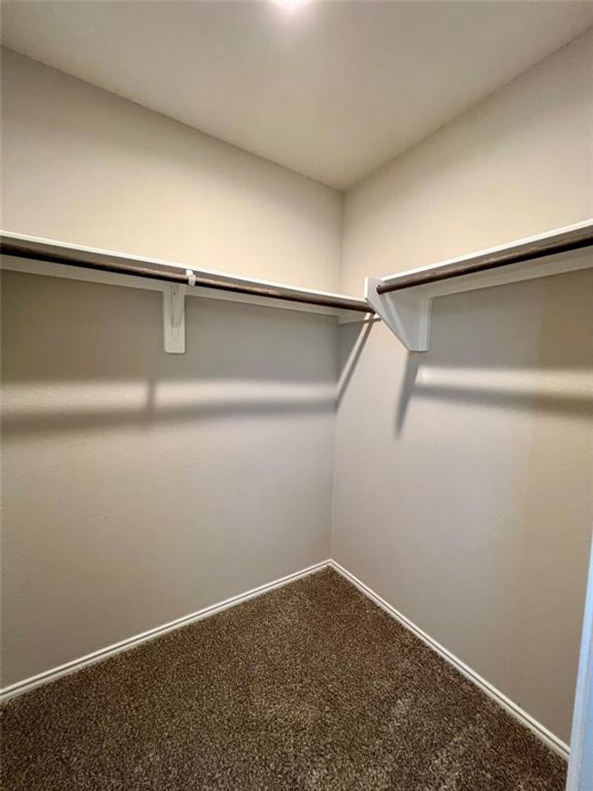 Walk in closet in bedroom 1 | Image 6